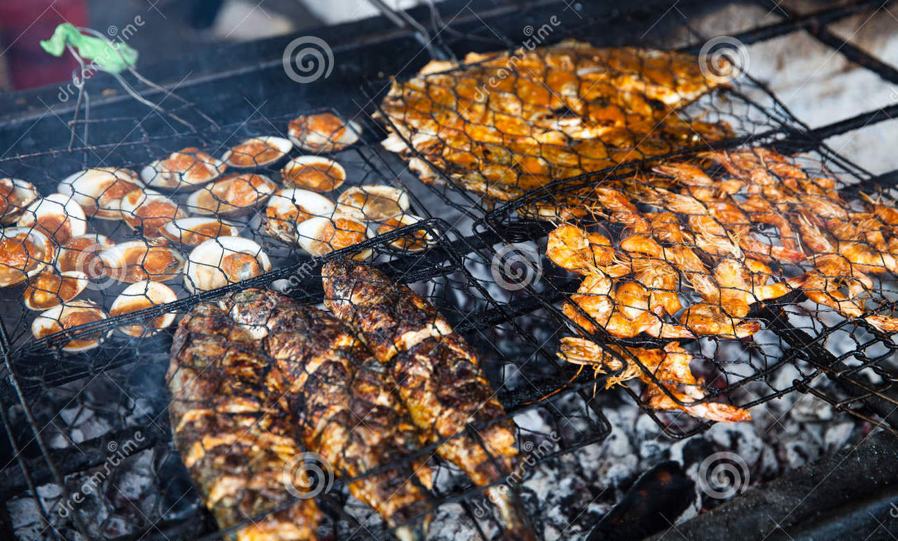 cooking bbq seafood background fire grilled fresh prawns fish octopus oysters food barbecue indonesia 71634966